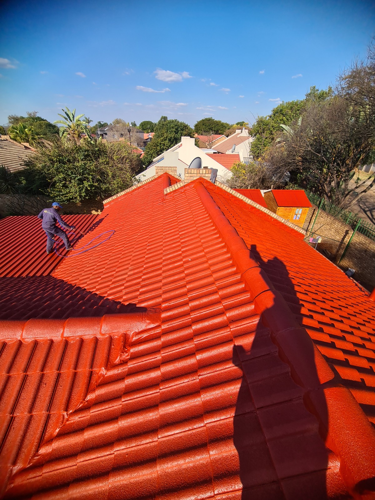 Freshly coated terracotta tile roof